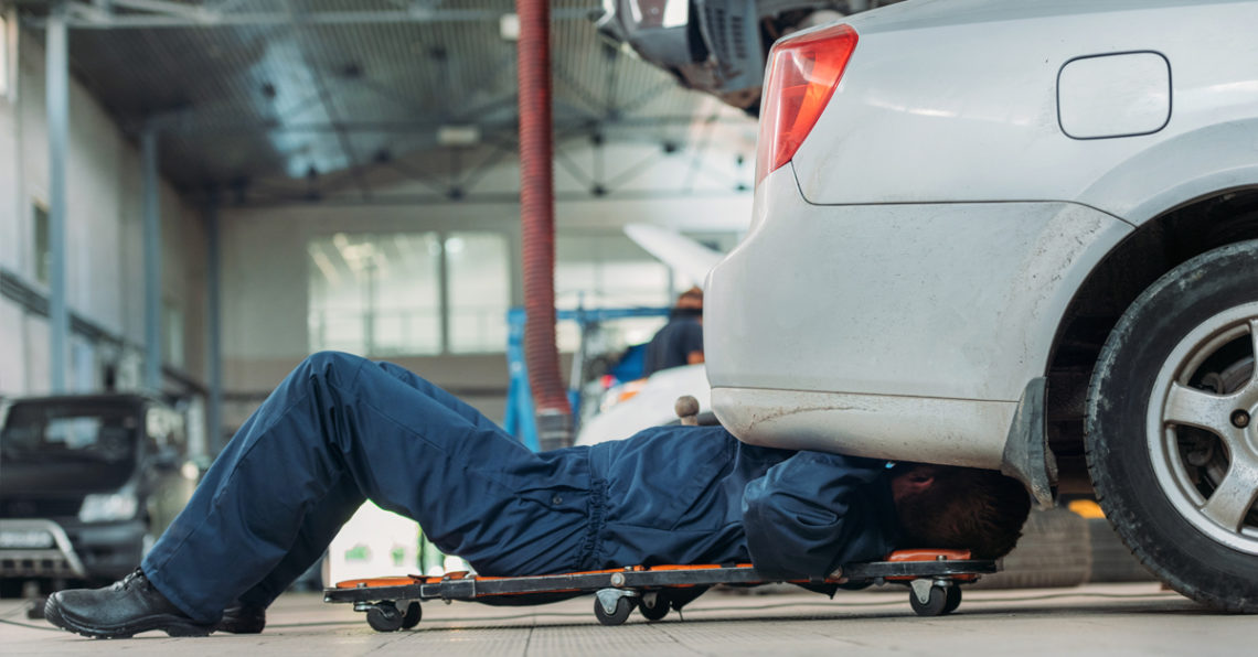 Auto mechanics wear welding gloves while working.