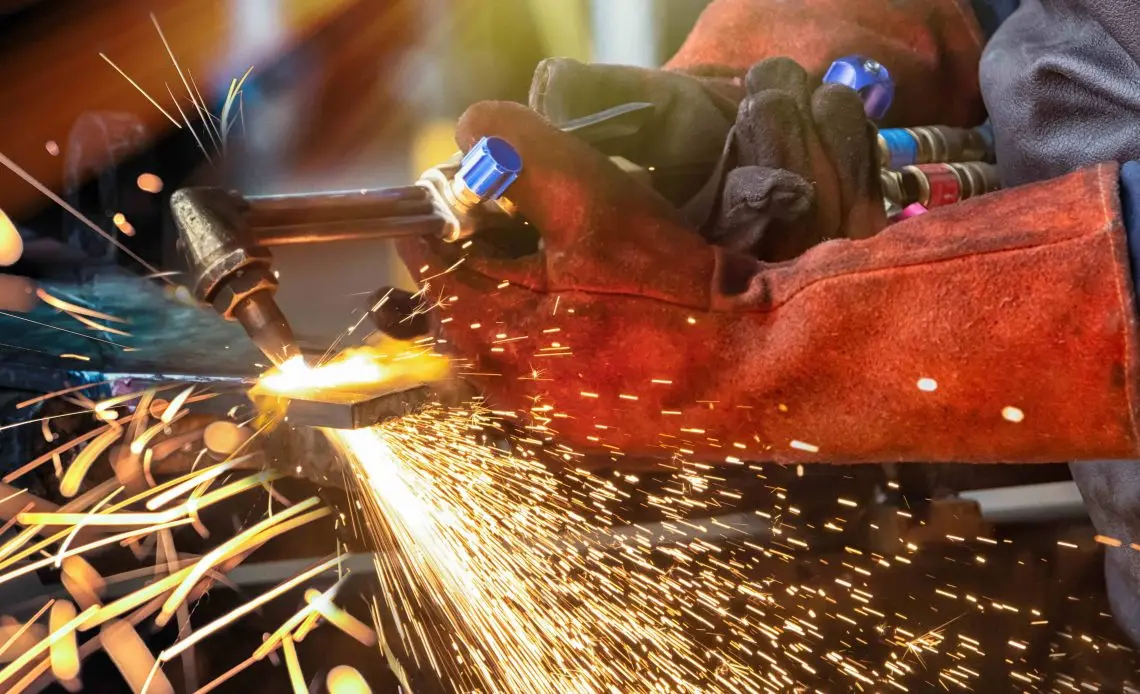 Wear welding gloves to protect against flying sparks