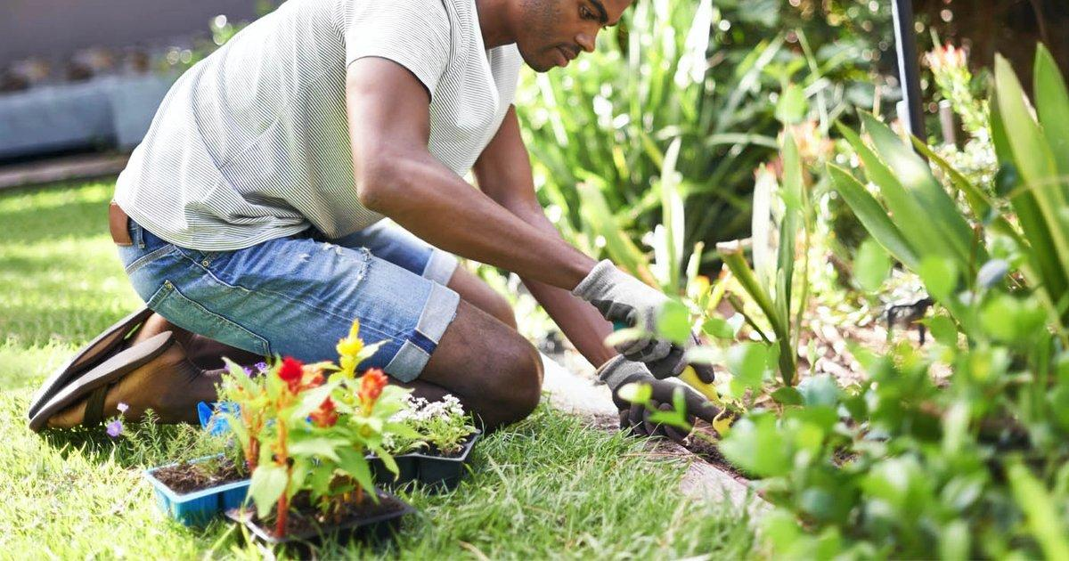 Gardening while wearing welding gloves
