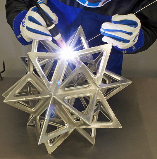 Welding Metal Art and Sculpture With Welding Gloves