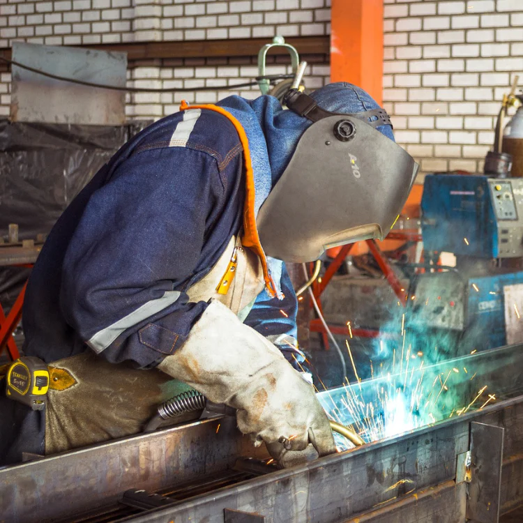 Welders use welding gloves while working.