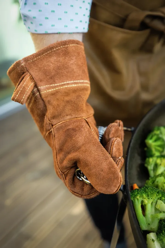 Move the hot pan with welding gloves.