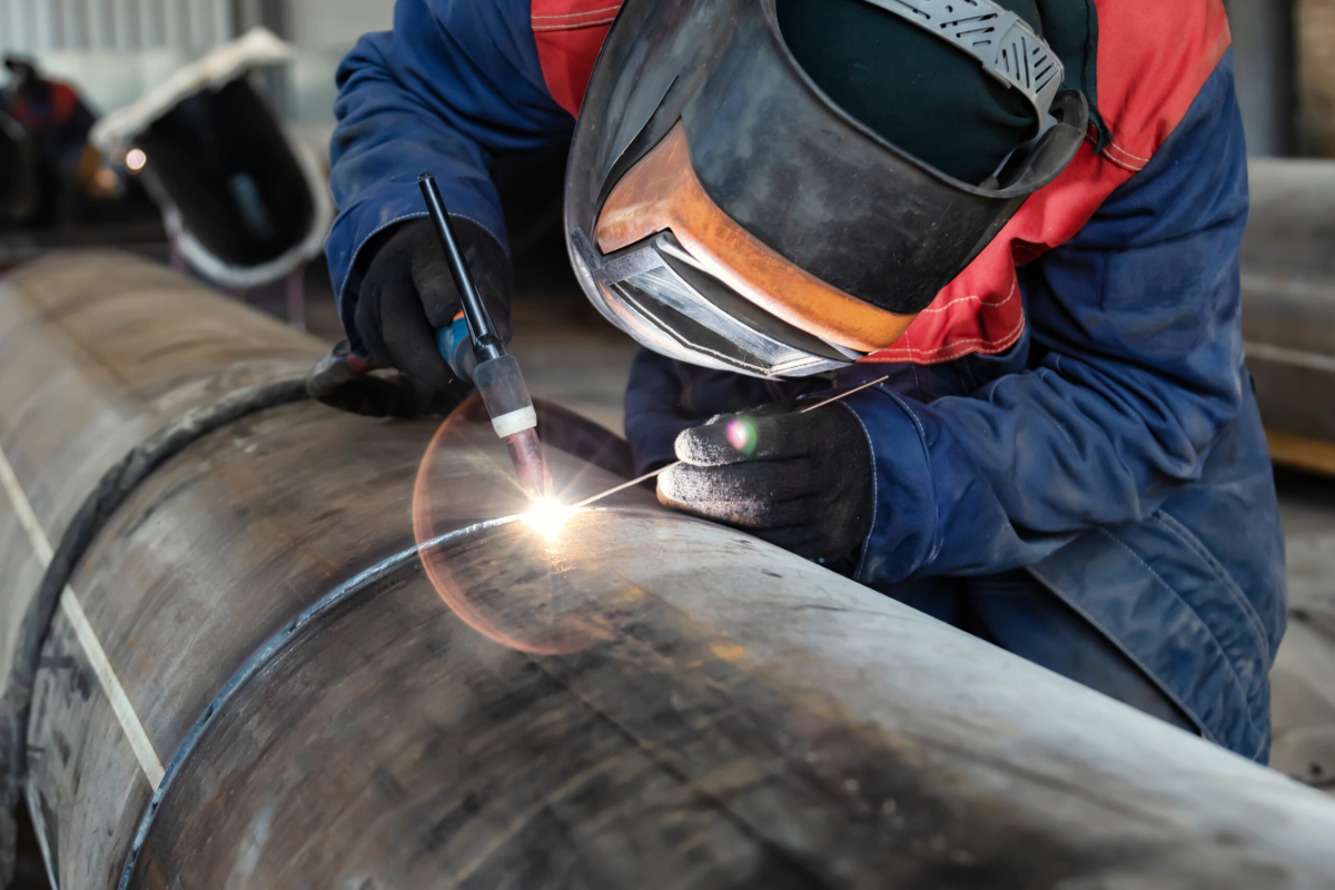 Wearing welding gloves for TIG welding